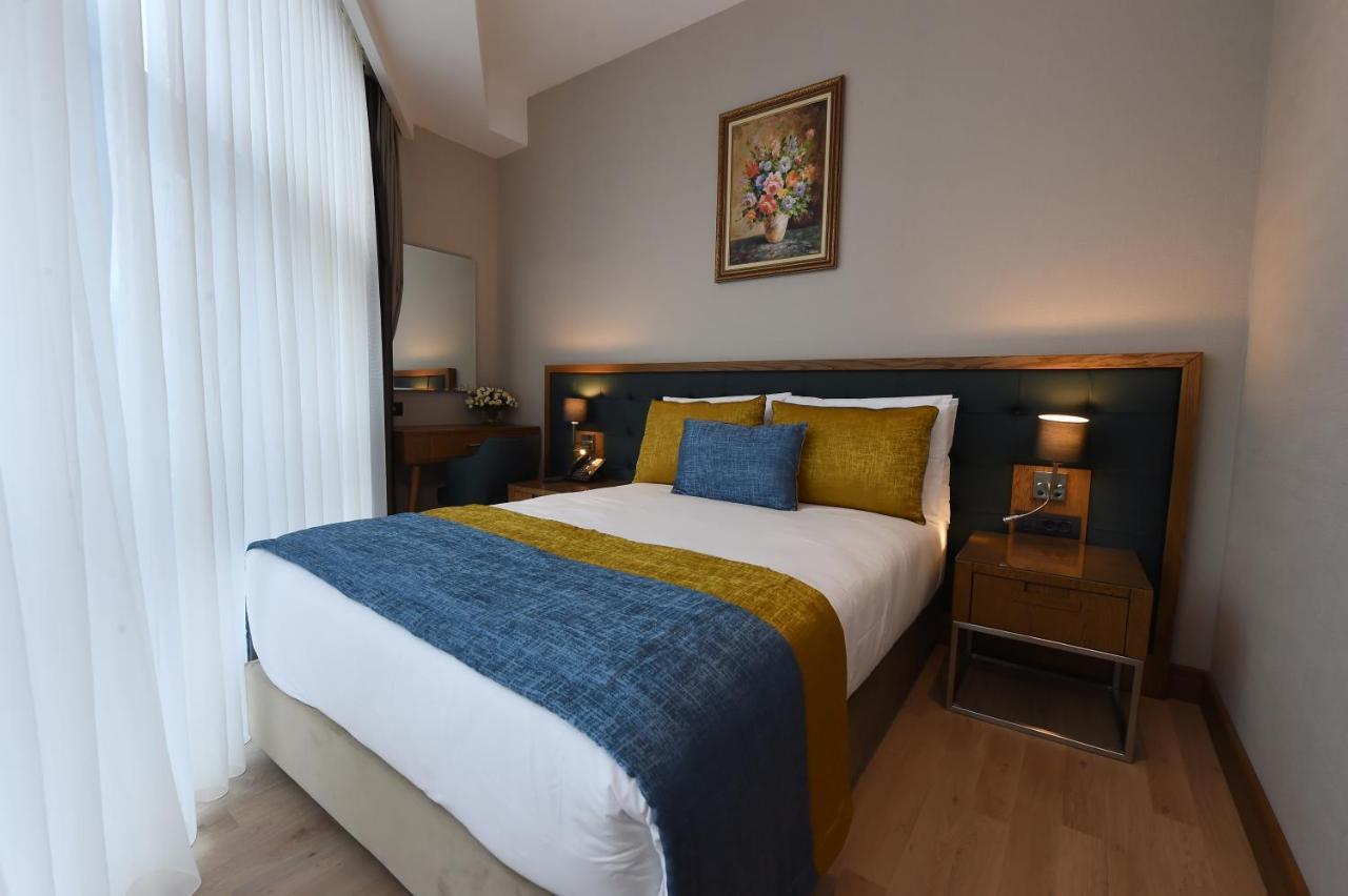 Cher Hotel & Spa Taksim Istambul Exterior foto A bedroom at the hotel